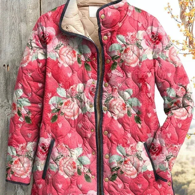 Aleid | Roze gewatteerde jas met bloemenmotief