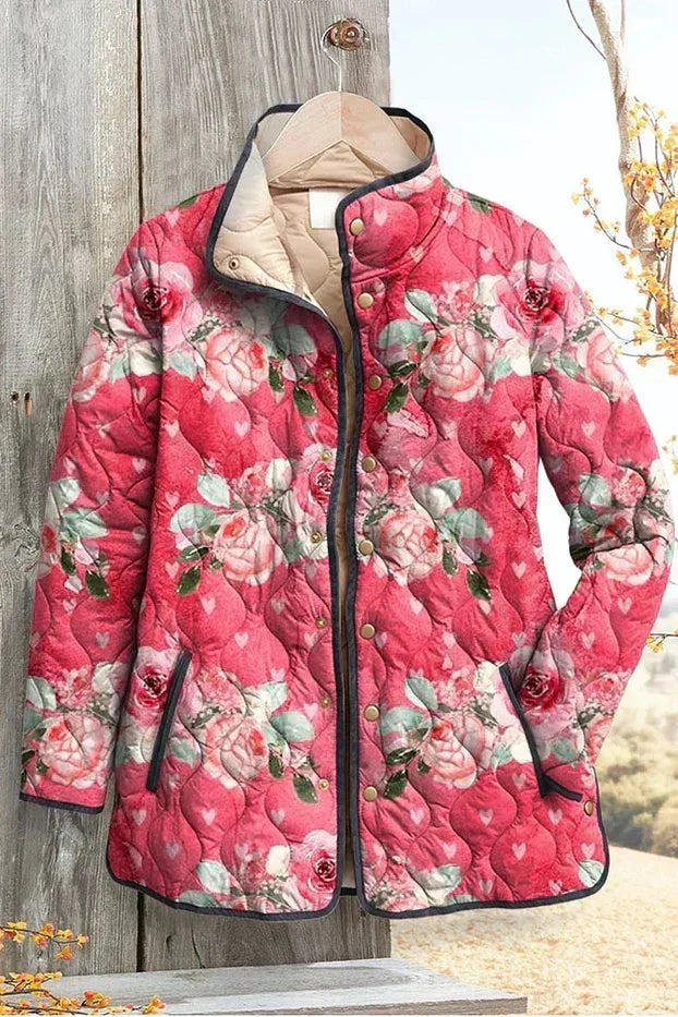 Aleid | Roze gewatteerde jas met bloemenmotief