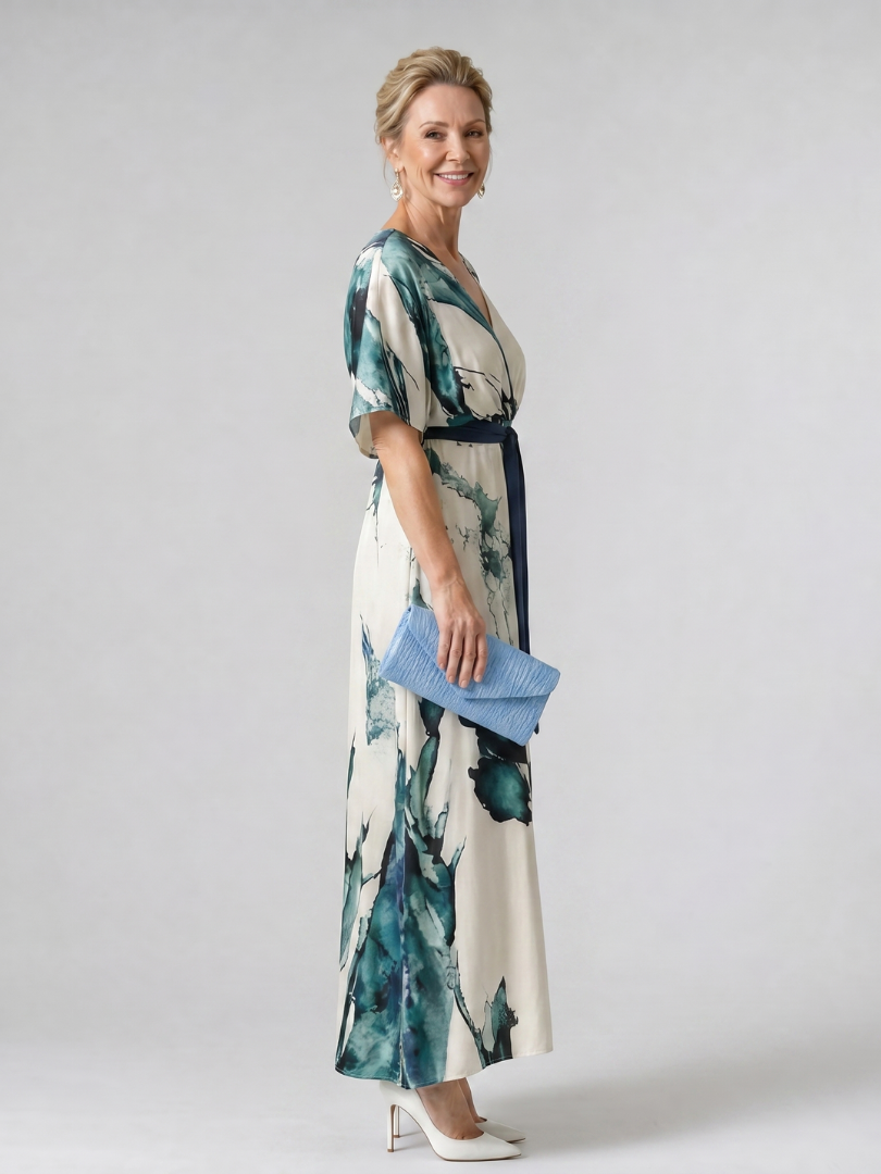 Baukje | Maxi-jurk met bladprint en bindceintuur