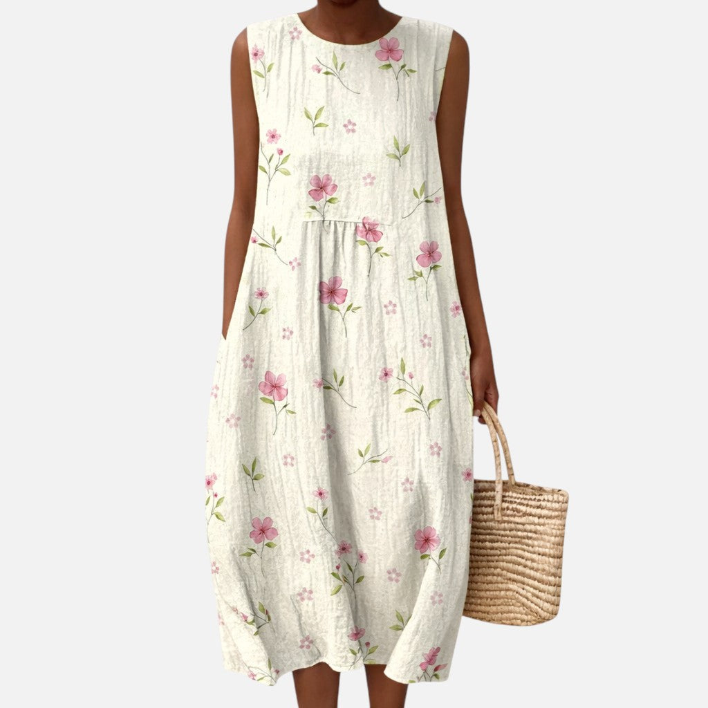 Carla | Mouwloze midi-jurk met kleine roze bloemen