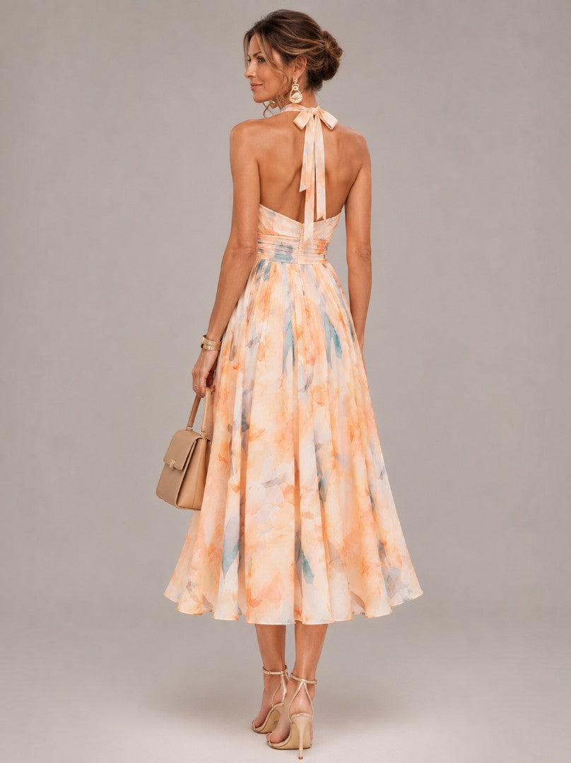 Diny | Midi-jurk met aquarelprint in abrikoos