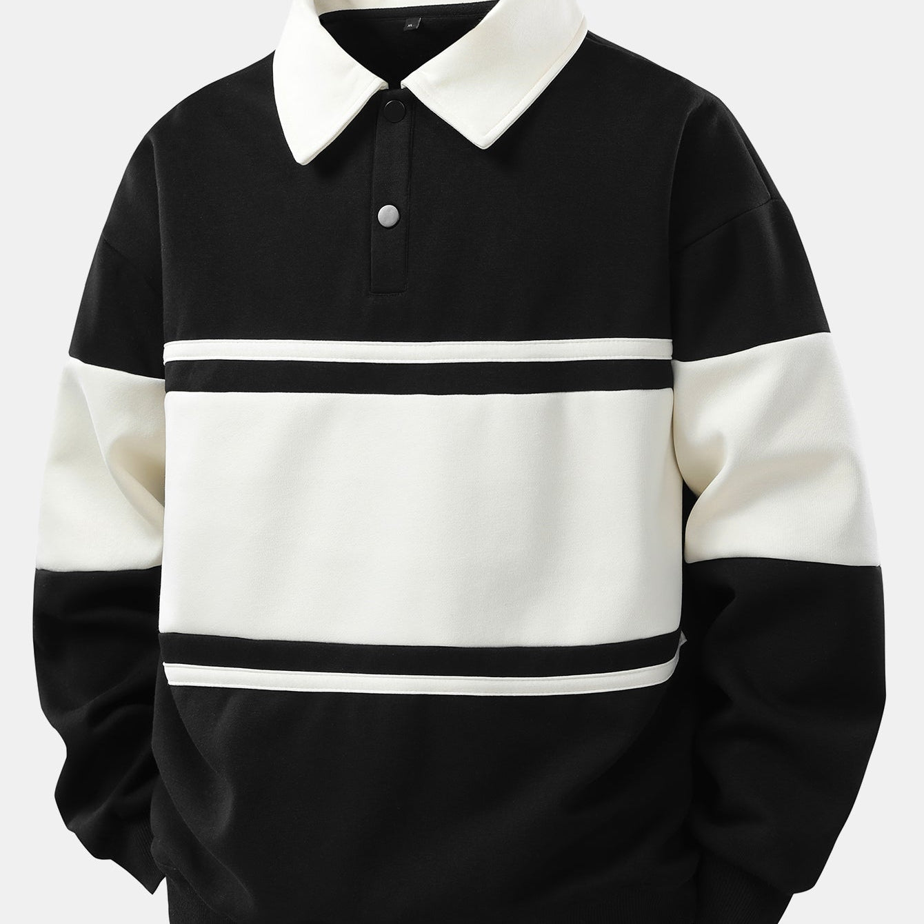 Hendrik | Polosweater met patchworkdetails en kleurvlakken en relaxte pasvorm