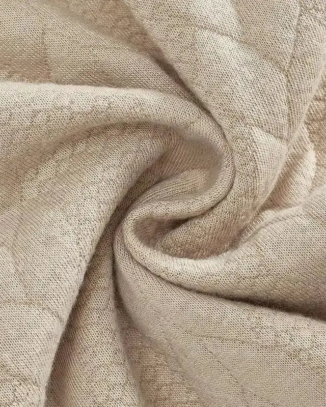 Jentje | Crèmekleurige kabeltrui met halve rits