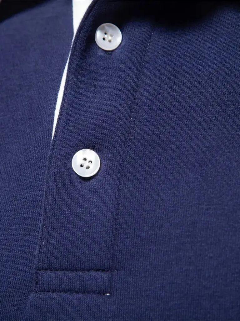 Justus | Marineblauwe polo met lange mouwen en ribboorden
