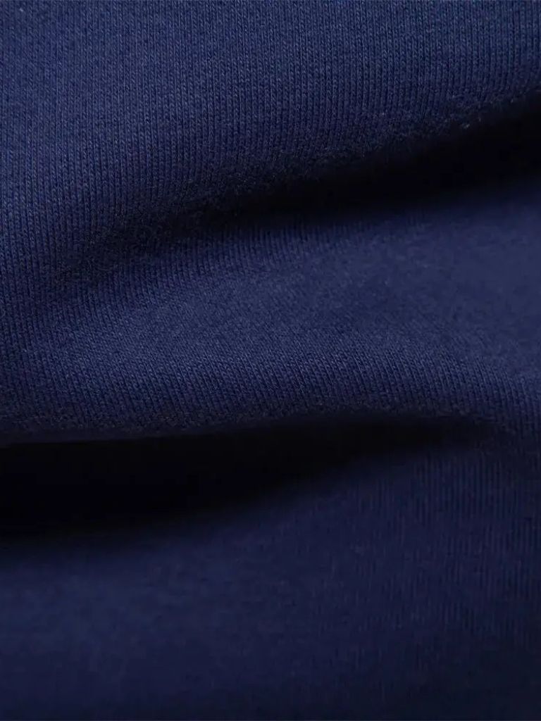 Justus | Marineblauwe polo met lange mouwen en ribboorden
