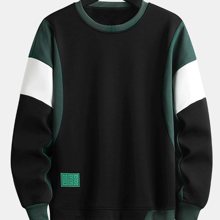 Levi | Sweater met patchworkdetails en kleurvlakken