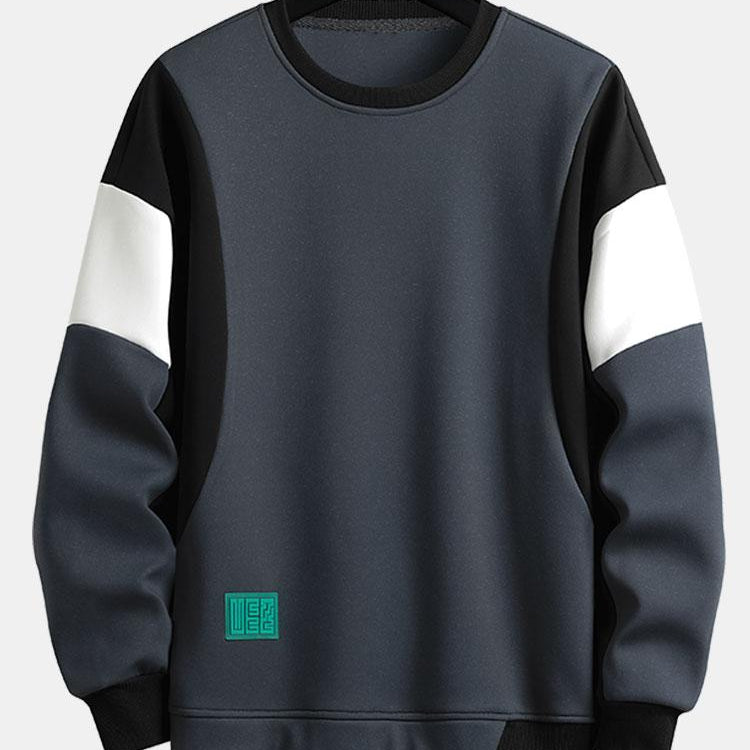 Levi | Sweater met patchworkdetails en kleurvlakken