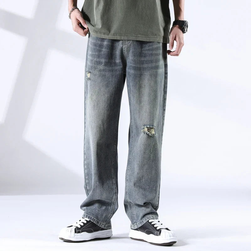 Nout | Verwassen jeans met scheurdetails en rechte pijpen