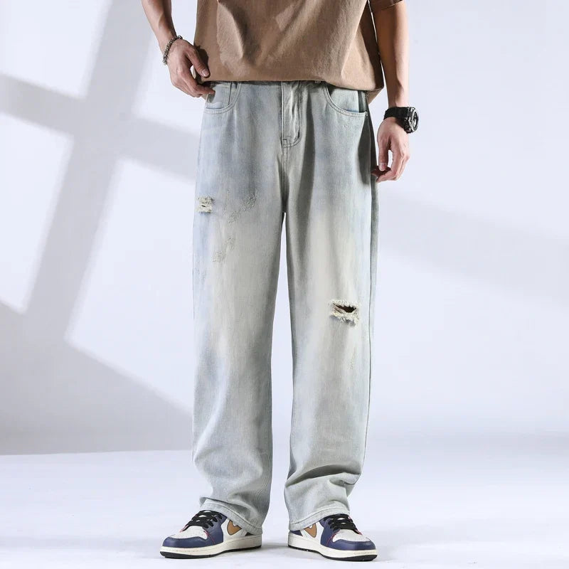 Nout | Verwassen jeans met scheurdetails en rechte pijpen