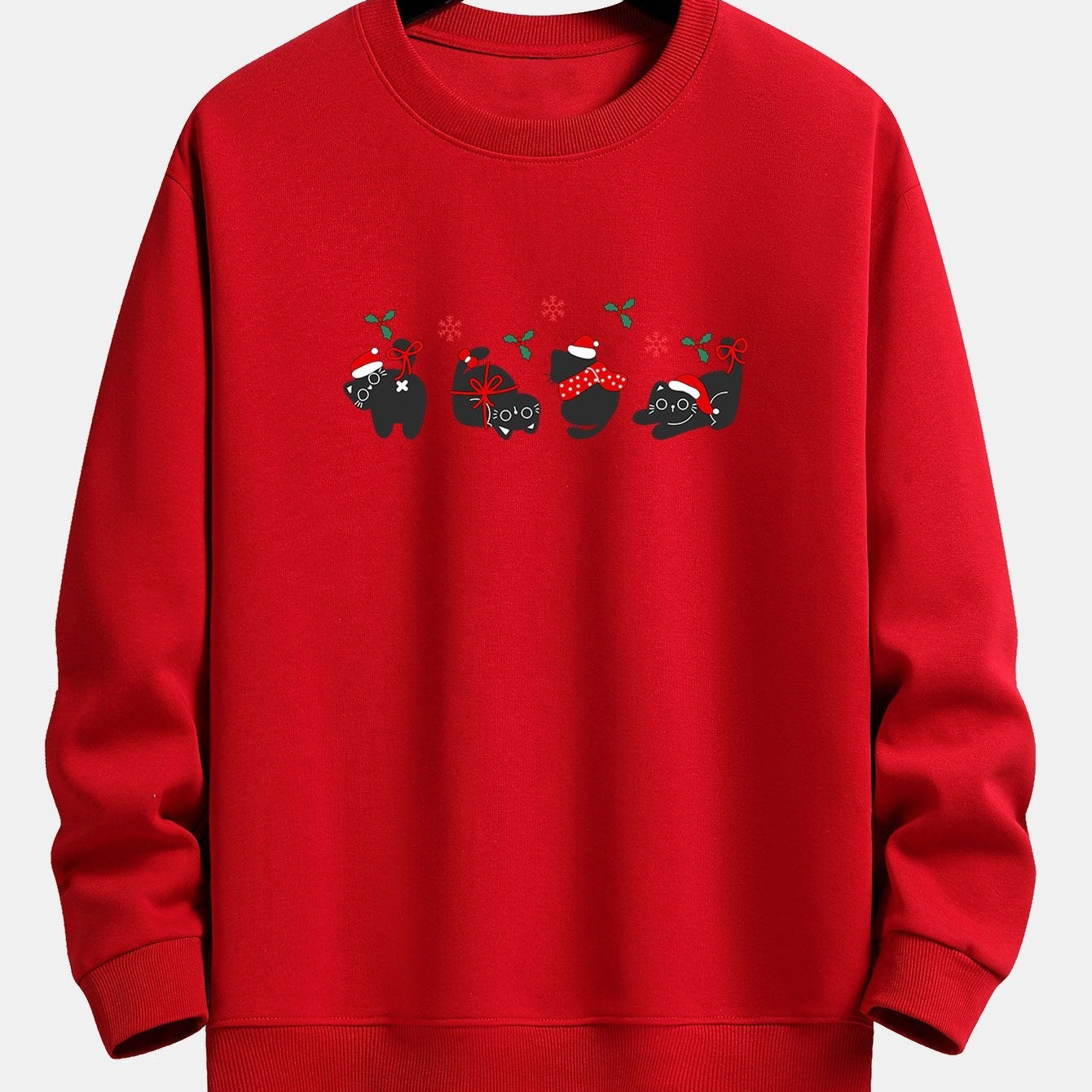 Oscar | Kerstsweater met zwarte kattenprint en relaxte pasvorm