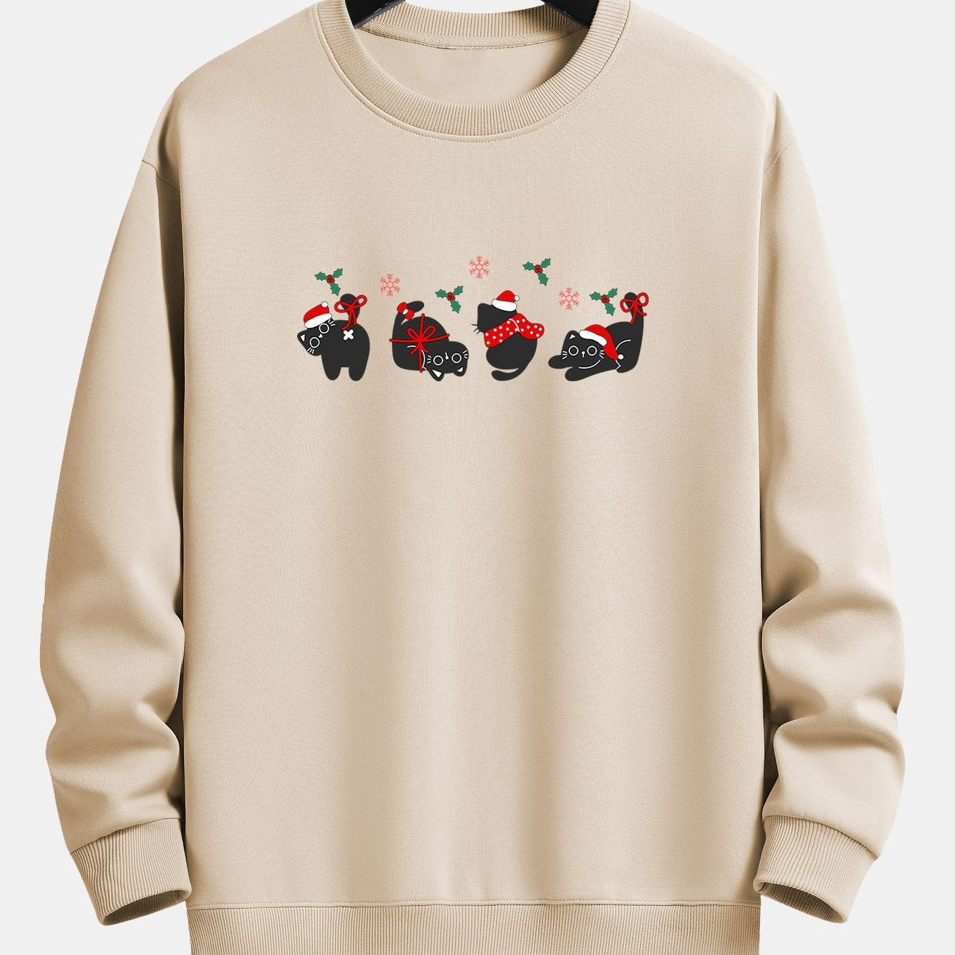Oscar | Kerstsweater met zwarte kattenprint en relaxte pasvorm