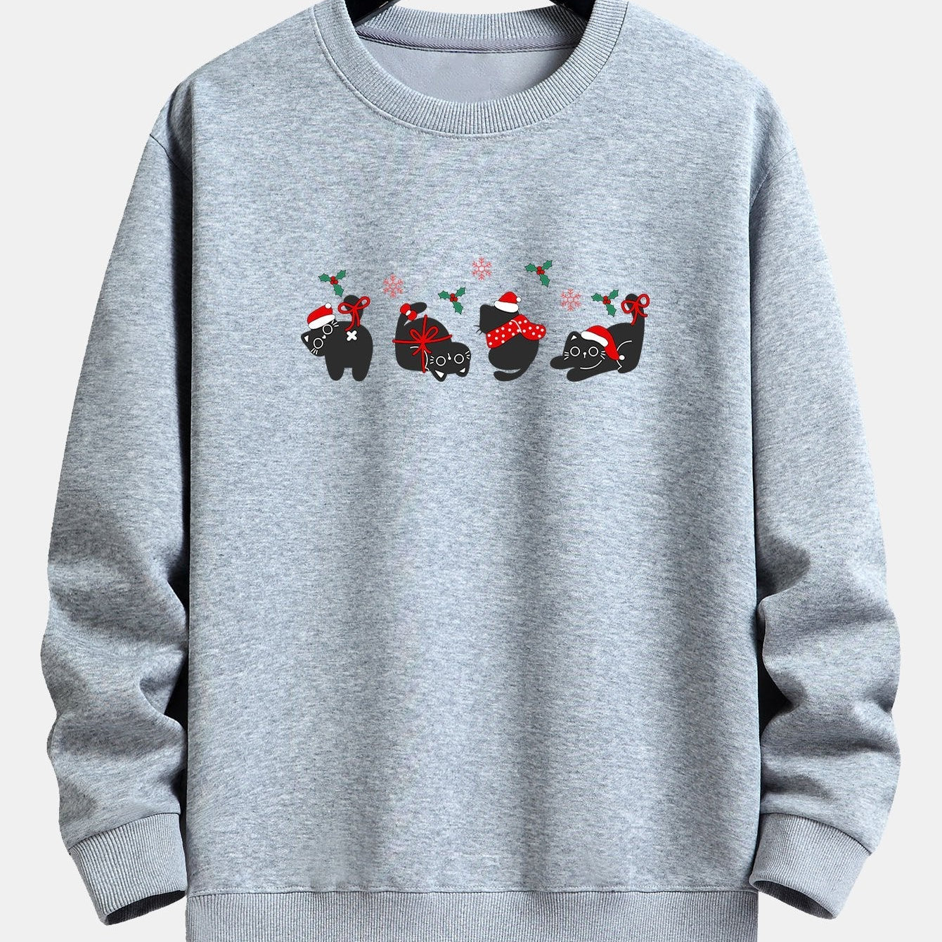 Oscar | Kerstsweater met zwarte kattenprint en relaxte pasvorm