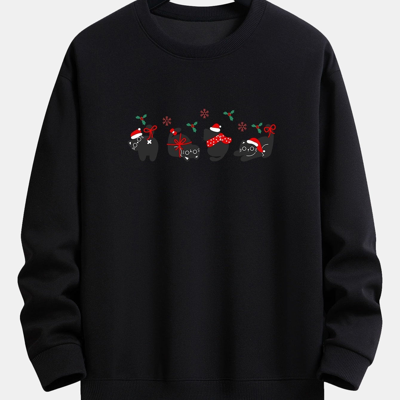 Oscar | Kerstsweater met zwarte kattenprint en relaxte pasvorm