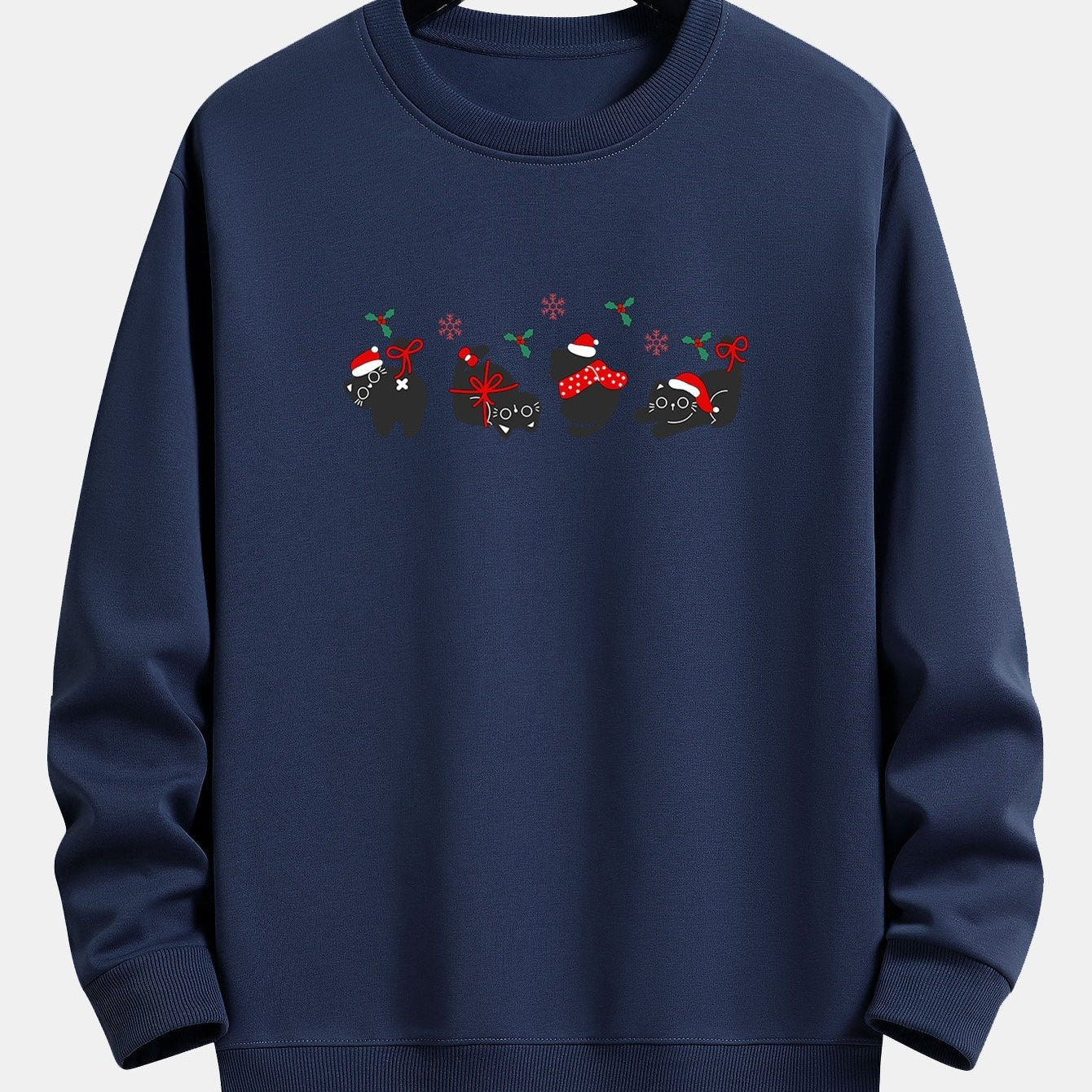 Oscar | Kerstsweater met zwarte kattenprint en relaxte pasvorm