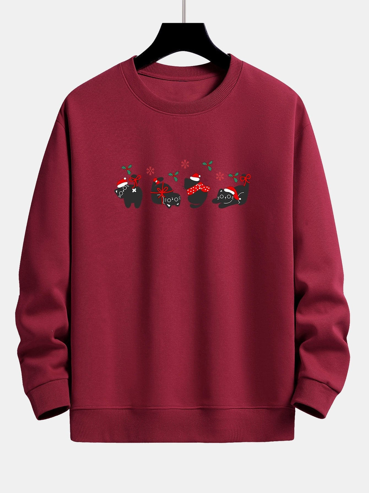 Oscar | Kerstsweater met zwarte kattenprint en relaxte pasvorm