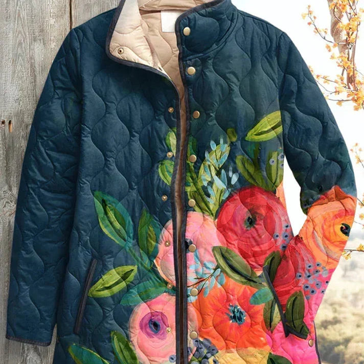 Trijntje | Donkerblauwe gewatteerde jas met bloemenmotief