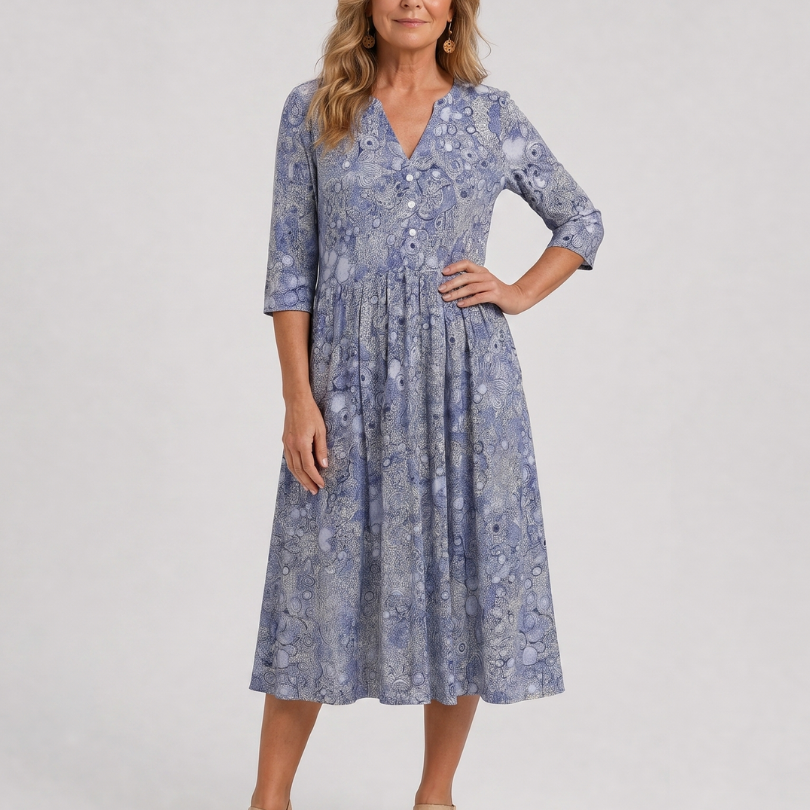 Wietske | Midi-jurk met strooibloemen in beige