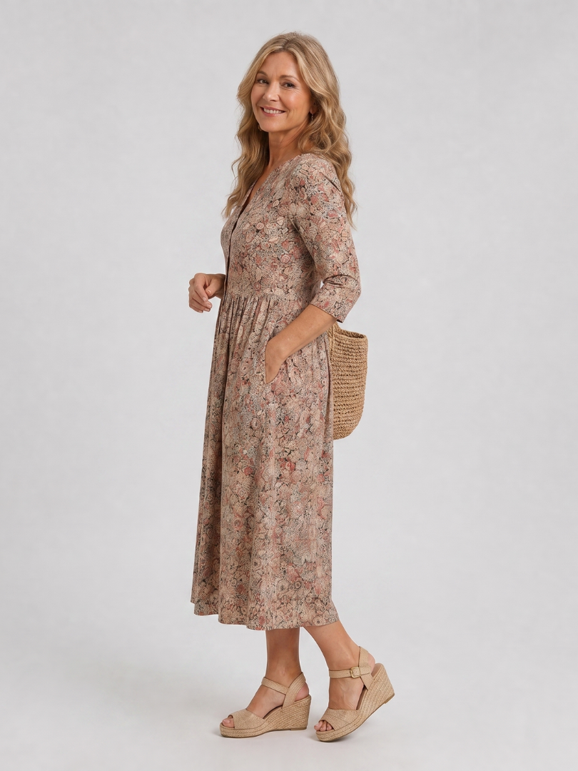 Wietske | Midi-jurk met strooibloemen in beige